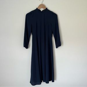 navy high neck dress with open back